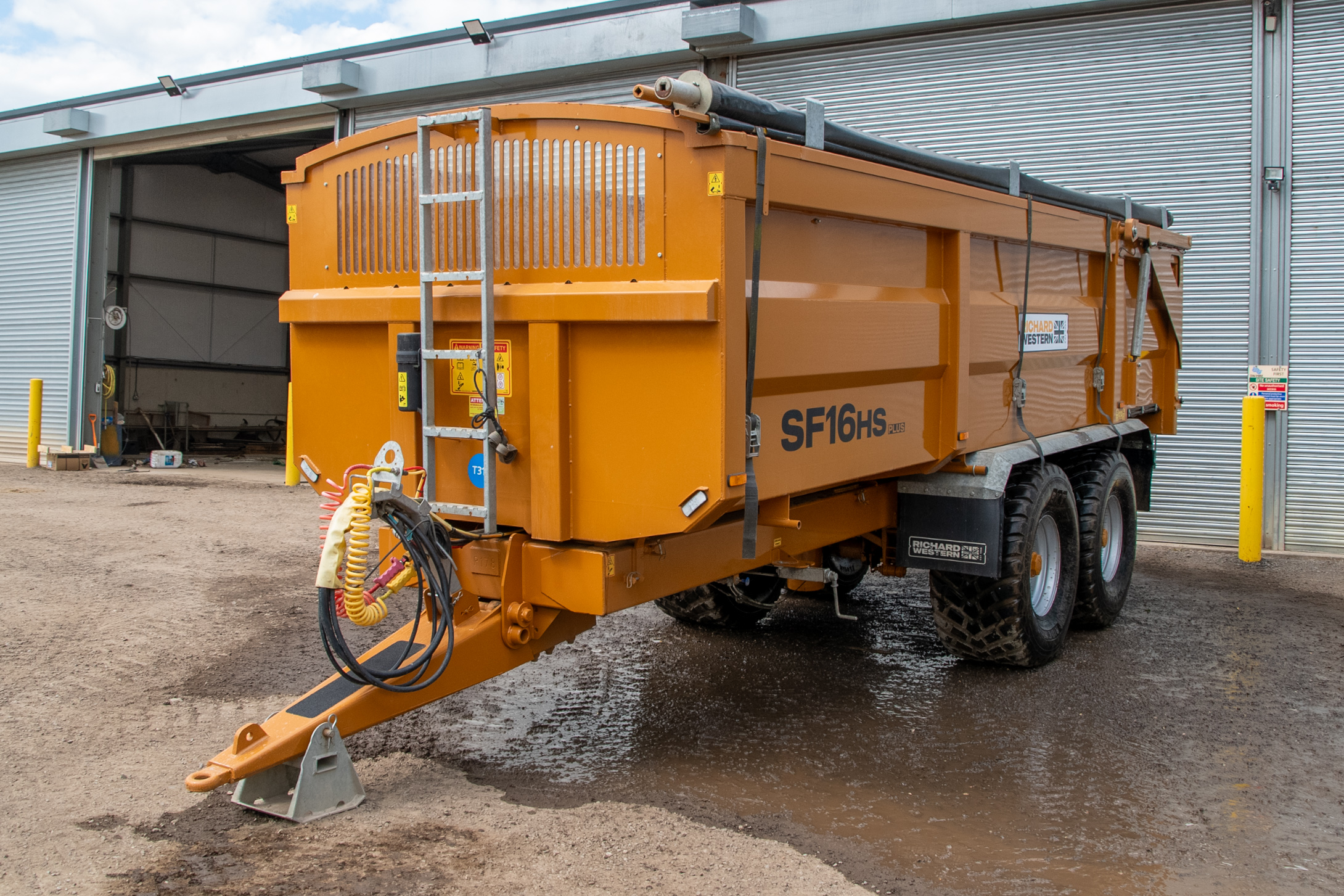 Richard Western SF16HS Grain Trailer with Rollover Sheet in front of workshop doors